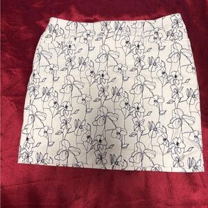 Chico's White Mini Skort with Black Floral Line Print, size 12 (Chico’s size 2)